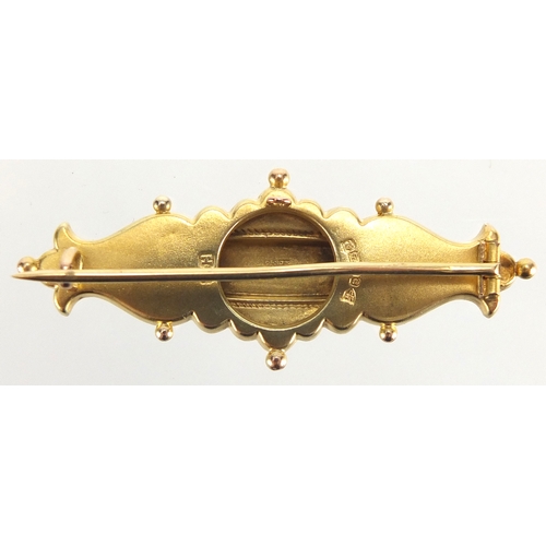 754 - 9ct gold Victorian style mourning brooch set with a diamond, 4.5cm in length