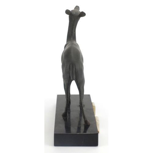 603 - Art Deco marble onyx sculpture mounted with a bronzed deer, 25cm wide