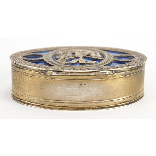 27 - Oval 800 grade silver box, the hinged lid with blue guilloche enamel and decorated with cherubs, 8cm... 