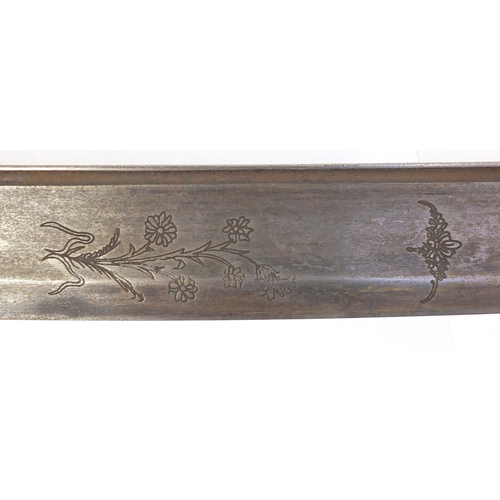 290 - WITHDRAWN - British Military interest sword with ornate scabbard, the steel blade with engraved moti... 