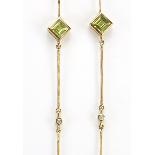 711 - Pair of Art Deco 9ct gold peridot and diamond drop earrings, 10cm in length, approximate weight 5.0g