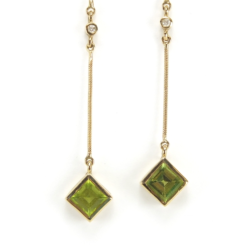 711 - Pair of Art Deco 9ct gold peridot and diamond drop earrings, 10cm in length, approximate weight 5.0g