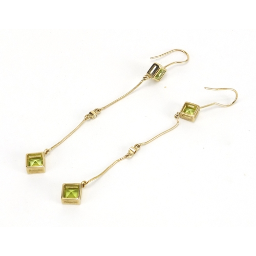 711 - Pair of Art Deco 9ct gold peridot and diamond drop earrings, 10cm in length, approximate weight 5.0g