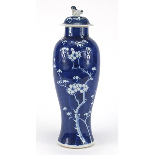 372 - Chinese blue and white porcelain baluster vase and cover, hand painted with Prunus flowers, blue rin... 