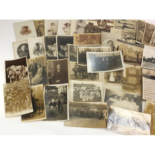 199 - Predominantly First World War and Social history postcards, some black and white including house fro... 