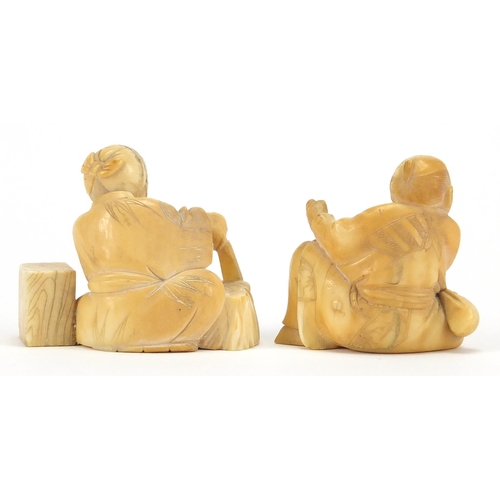 447 - Pair of Japanese carved ivory Okimono's, both of seated workers, each 5cm high