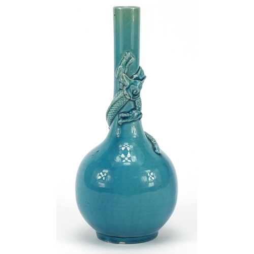 385 - Chinese turquoise glazed bottle vase, decorated in relief with a dragon, 20.5cm high