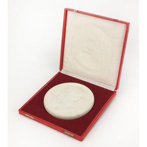 534 - Large Meissen Parian plaque, housed in a fitted silk lined case, the plaque 15cm in diameter