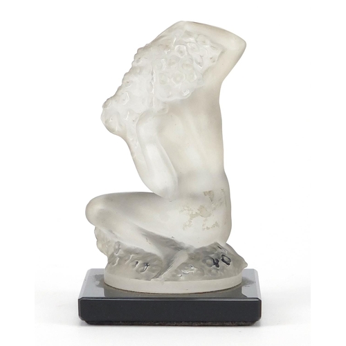 553 - Frosted glass paperweight of a nude female, on a square glass base, etched Lalique France, 9cm high