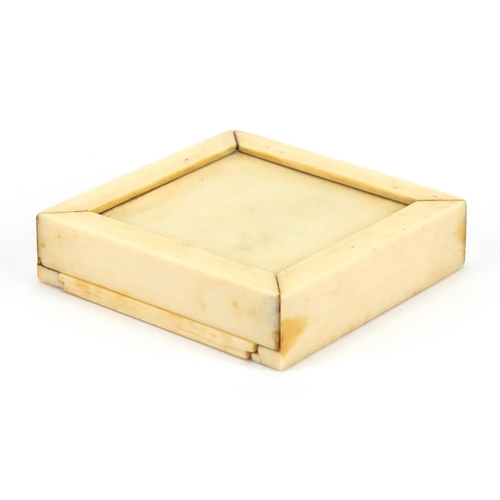 438 - Chinese Canton ivory puzzle box, the slide off lid carved with foliate motifs, the box 6.5cm x 6.5cm