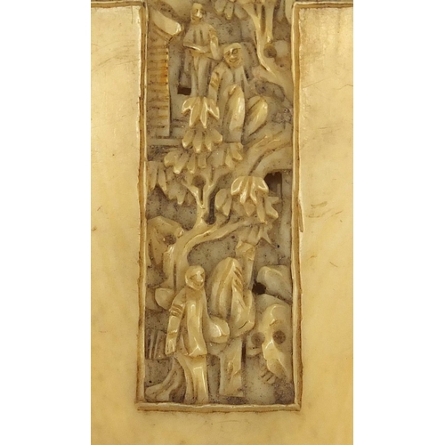 443 - Chinese rectangular Canton ivory card case, carved with panels of figures amongst pagodas, 8.5cm H x... 