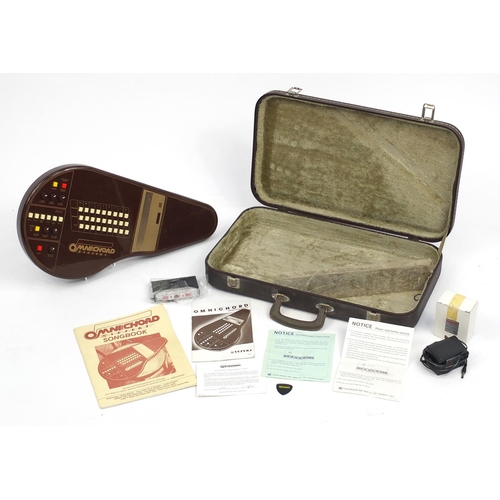 147 - Vintage Omnichord by Suzuki with fitted case, 51.5cm wide