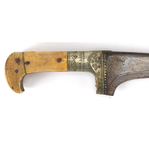 493 - Middle Eastern dagger with sheath and ivory grip, the sheath engraved with panels of flowers, 42cm i... 