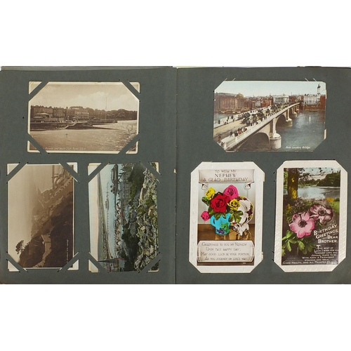 200 - Topographical social history and greetings postcards, arranged in two albums some photographic inclu... 
