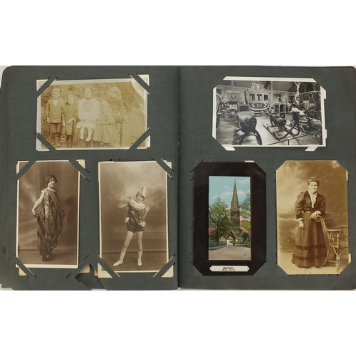 200 - Topographical social history and greetings postcards, arranged in two albums some photographic inclu... 