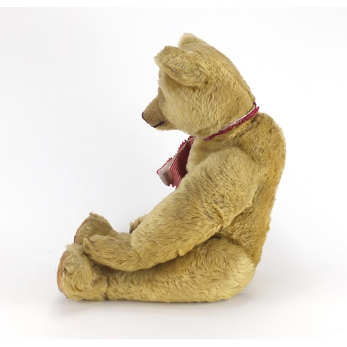 330 - Vintage golden straw filled teddy bear with jointed limbs and beaded glass eyes, 63cm high