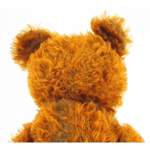 333 - Vintage golden straw filled teddy bear with jointed limbs and beaded glass eyes, 65cm high