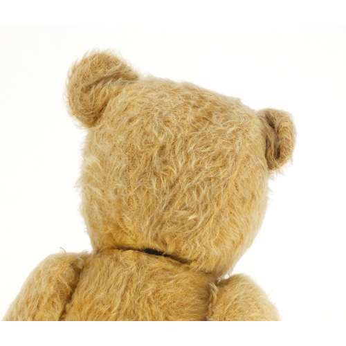 332 - Vintage Chiltern hygienic teddy bear with jointed limbs, beaded eyes and label, 48cm high