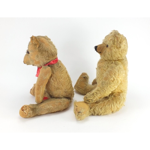 334 - Two vintage golden teddy bear's, one straw filled, both with jointed limbs and beaded eyes, the larg... 