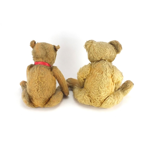 334 - Two vintage golden teddy bear's, one straw filled, both with jointed limbs and beaded eyes, the larg... 