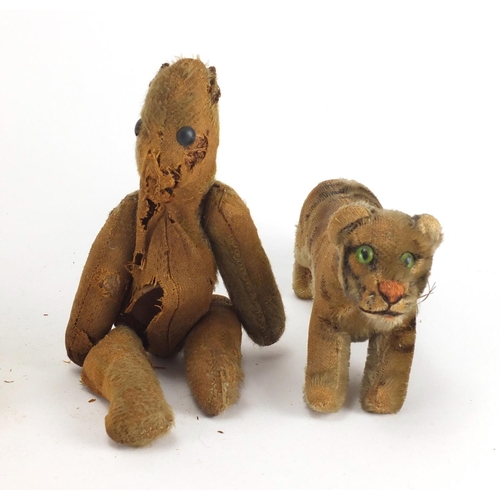 337 - Two vintage straw filled teddy's with beaded eyes, straw filled tiger and one other, the largest 33c... 