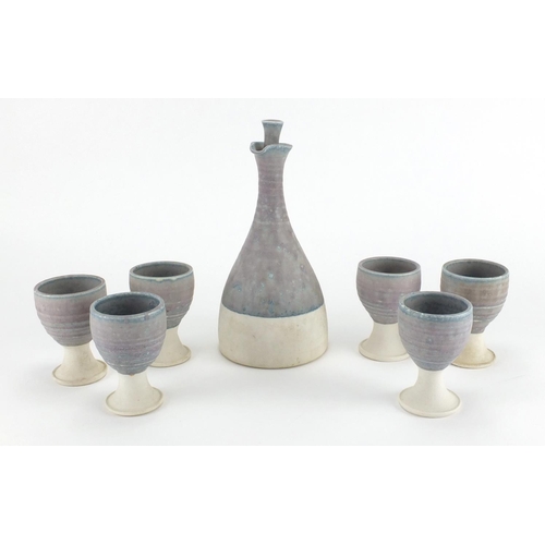 593 - St Ives Studio pottery wine bottle and six matching goblets, impressed marks and dated 1973, the lar... 