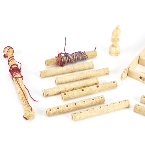 444 - Chinese Canton ivory including an abacus finely carved with foliage, the largest 15cm wide