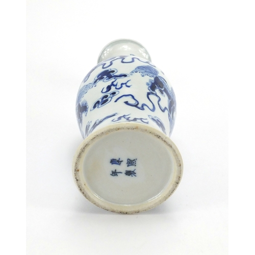 370 - Chinese blue and white porcelain baluster vase, hand painted with Qilin lions amongst clouds, 27cm h... 