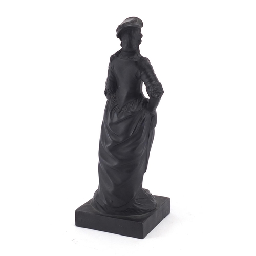 519 - 19th century English basalt figure of a lady in traditional dress, 21.5cm high