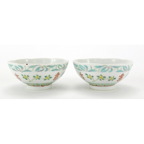 360 - Pair of Chinese porcelain footed bowls, hand panted with flowers, six figure iron red character mark... 