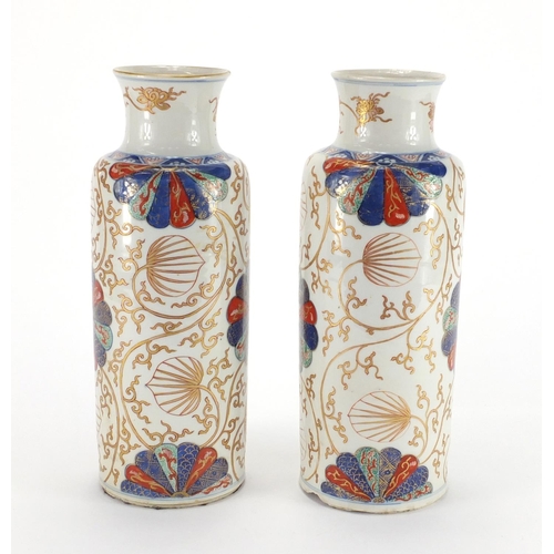 363 - Pair of Chinese porcelain cylindrical vases, possibly Kangxi period, both hand painted in the Imari ... 