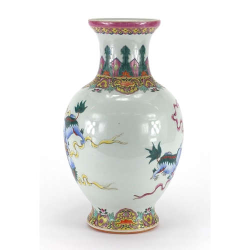 364 - Chinese porcelain baluster vase, hand painted in the famille rose palette with kylin lions chasing t... 