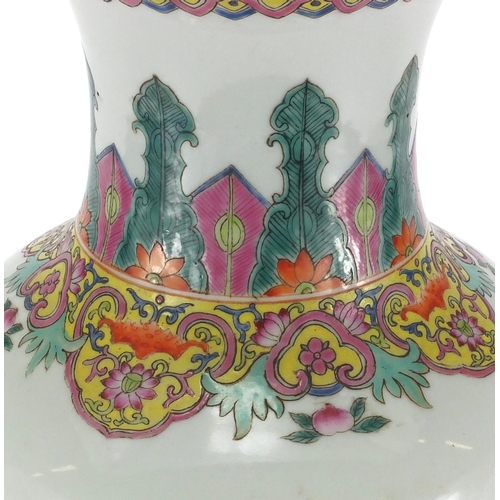 364 - Chinese porcelain baluster vase, hand painted in the famille rose palette with kylin lions chasing t... 