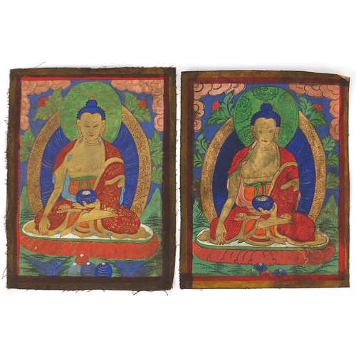 460 - Pair of Sino Tibetan silk panels, both hand painted with Buddha, each 37cm x 28cm