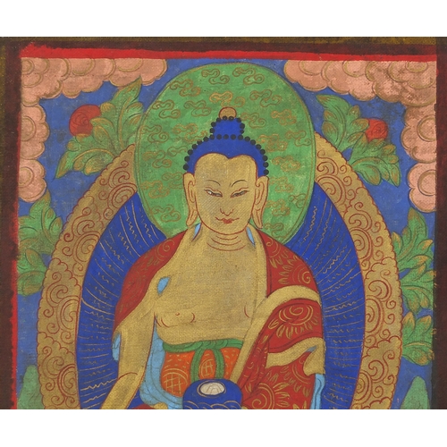 460 - Pair of Sino Tibetan silk panels, both hand painted with Buddha, each 37cm x 28cm