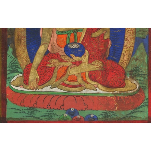 460 - Pair of Sino Tibetan silk panels, both hand painted with Buddha, each 37cm x 28cm