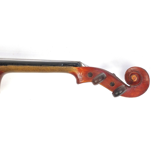 137 - Old wooden violin with scrolled neck, bow and fitted carrying case, the violin back 13.5