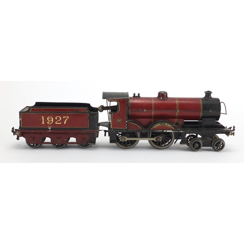 311 - OO gauge Duke of York clockwork locomotive and tender numbered 1927, 23cm in length