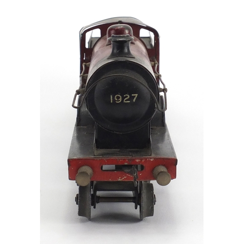 311 - OO gauge Duke of York clockwork locomotive and tender numbered 1927, 23cm in length