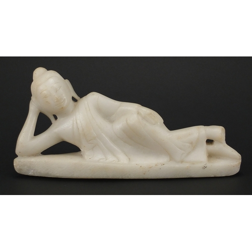 478 - Oriental white marble carving of a reclining Deity, 27.5cm in length