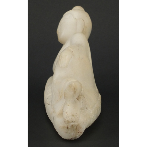 478 - Oriental white marble carving of a reclining Deity, 27.5cm in length