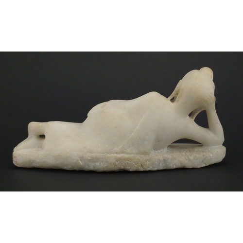 478 - Oriental white marble carving of a reclining Deity, 27.5cm in length