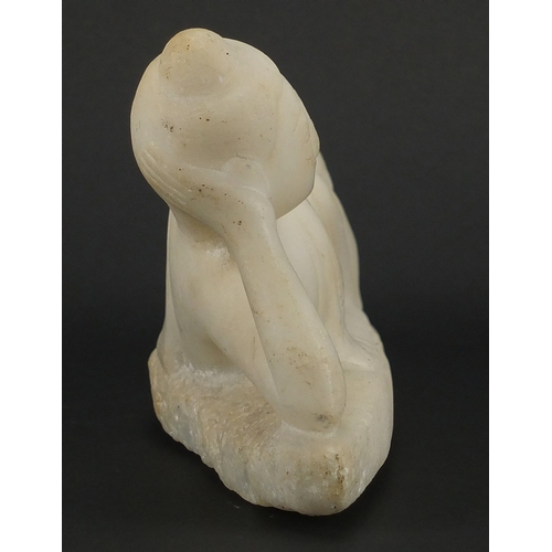 478 - Oriental white marble carving of a reclining Deity, 27.5cm in length