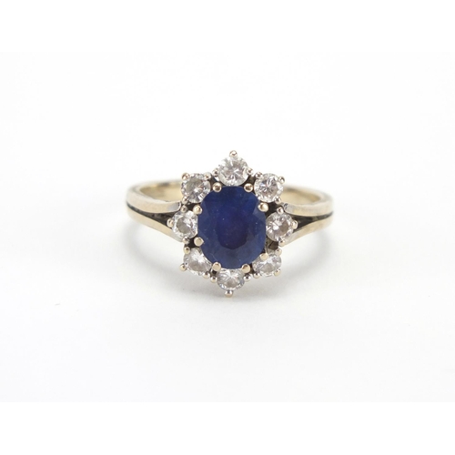 677 - 18ct white gold sapphire and diamond ring, size O, approximate weight 4.5g