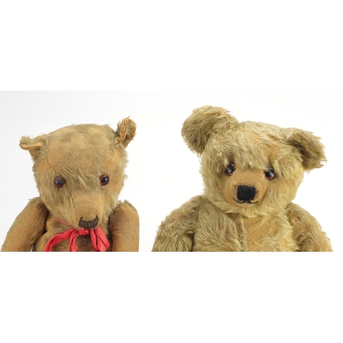 334 - Two vintage golden teddy bear's, one straw filled, both with jointed limbs and beaded eyes, the larg... 