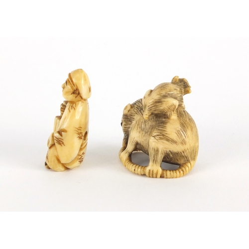 448 - Two Japanese carved Netsuke's, one of a seated figure, the largest 3cm high