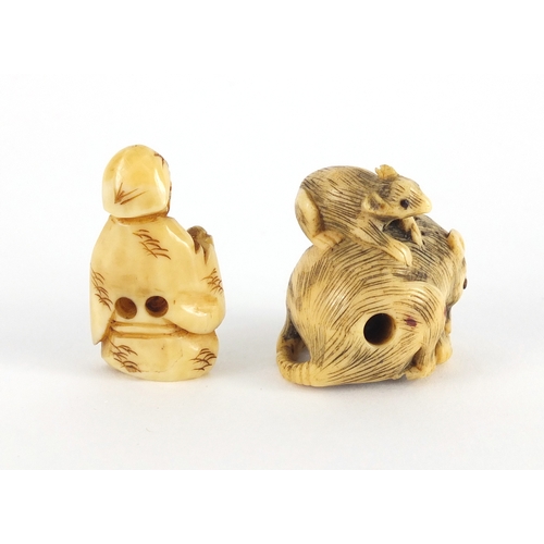 448 - Two Japanese carved Netsuke's, one of a seated figure, the largest 3cm high