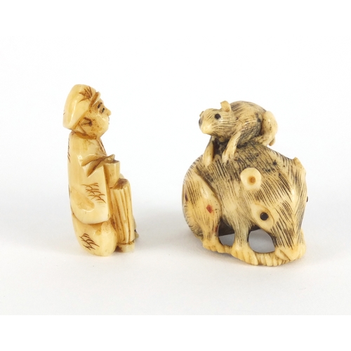 448 - Two Japanese carved Netsuke's, one of a seated figure, the largest 3cm high