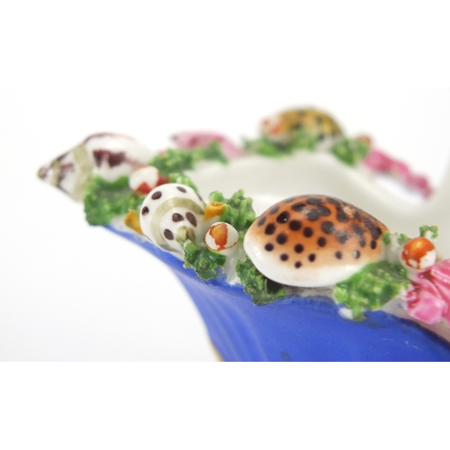 512 - Staffordshire porcelain basket with floral encrusted rim decorated with sea shells and naturalistic ... 