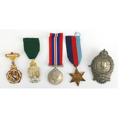 266 - British Military World War II Militaria including George V Royal Navy Reserve decoration with fitted... 